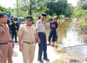 Pj Bupati Muna Barat Tinjau Banjir di Penghubung Desa Labokolo dan Desa Wanseriwu